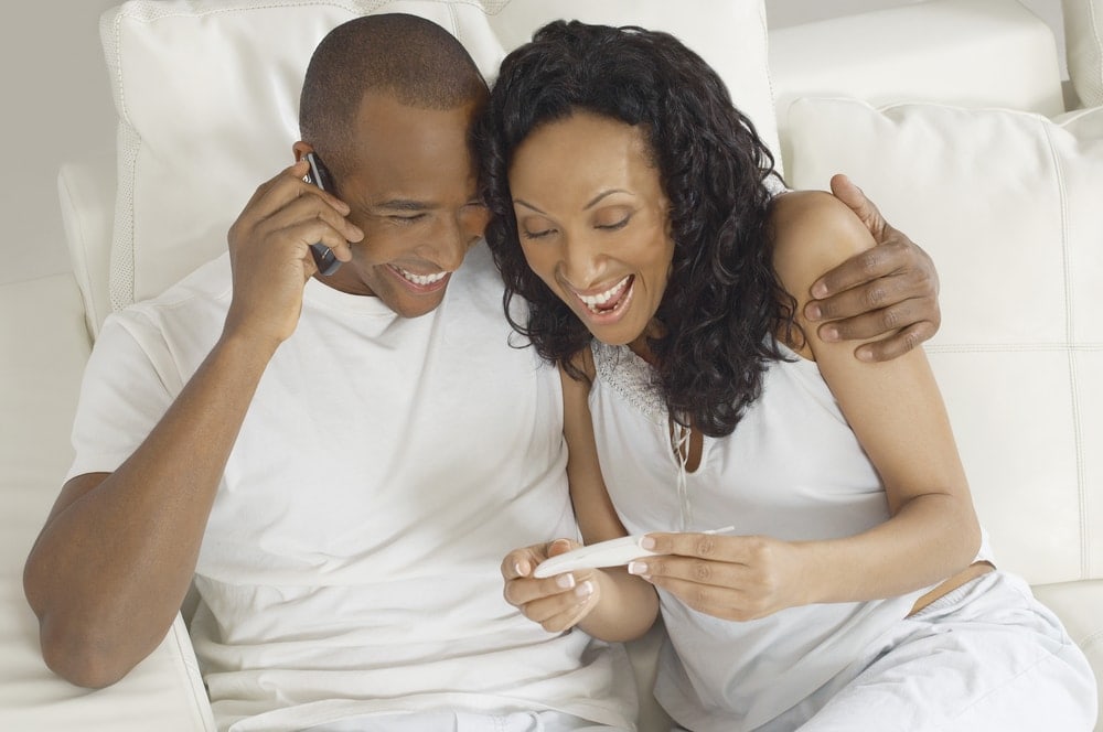Couple reviewing the results of their pregnancy test